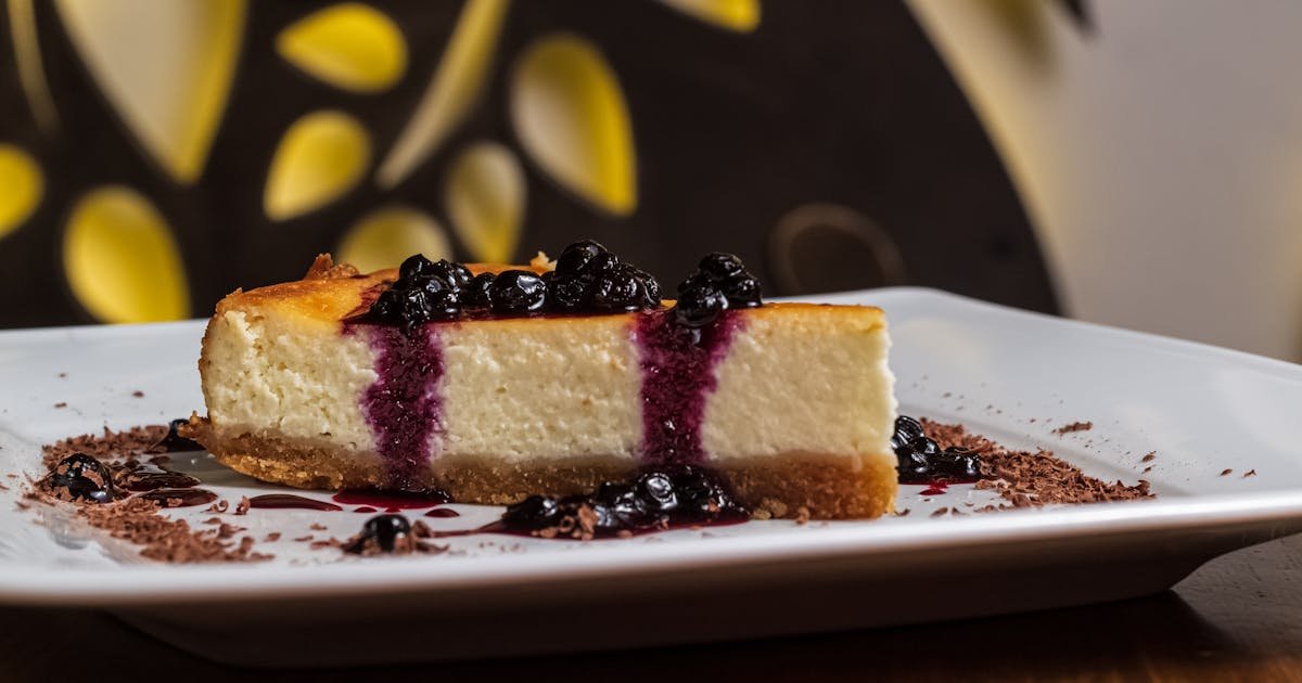 Classic New York Cheesecake with Perfect Berry Sauce